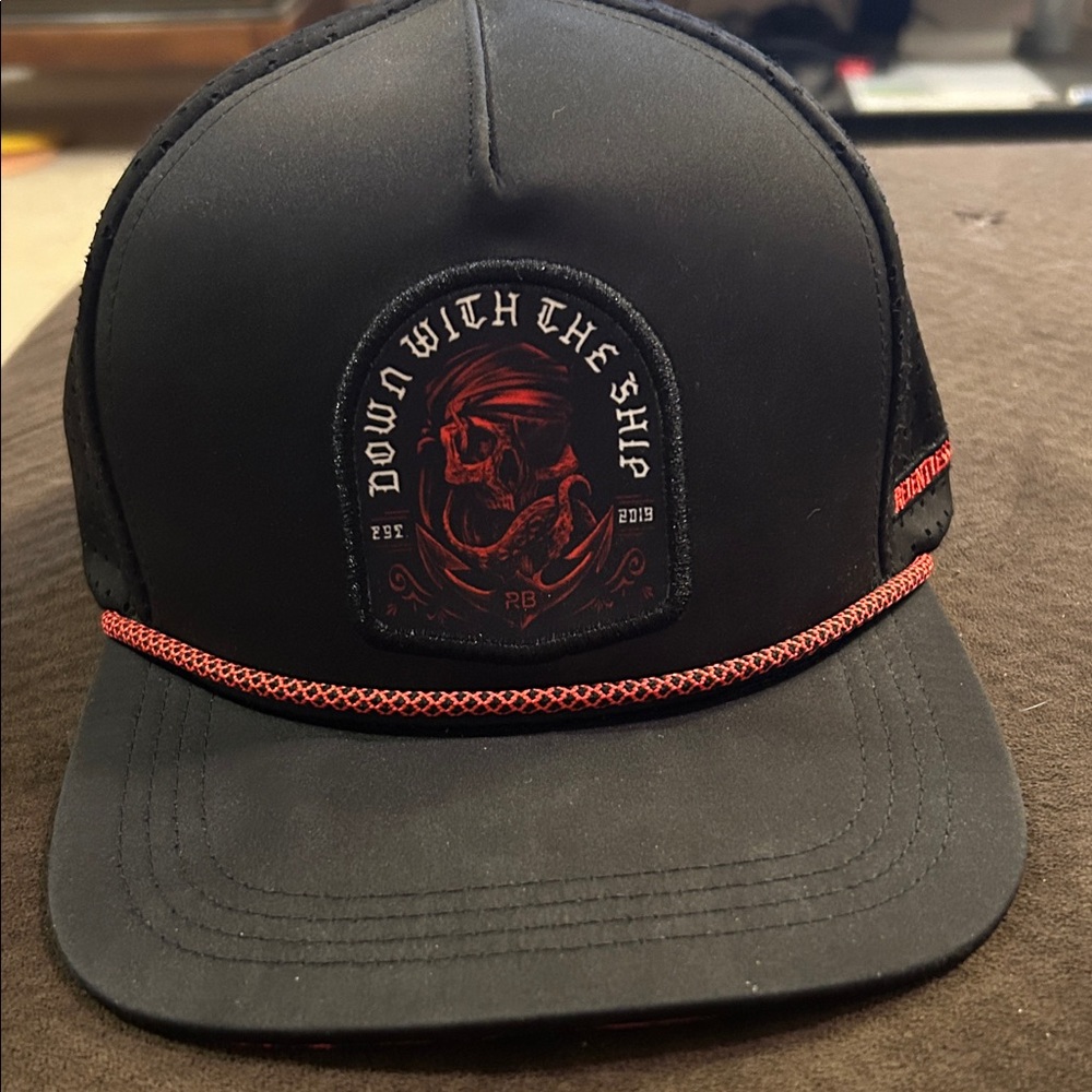 Relentless betrayal Black and Red Skull Cap